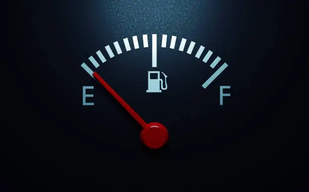 Photo of Fuel gauge with a red needle indicating empty. 3d render
