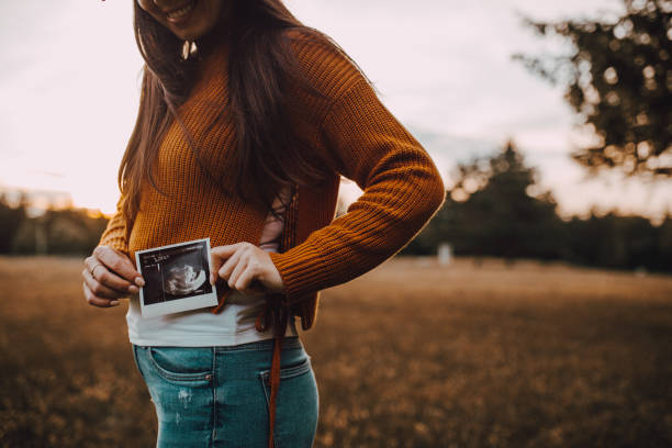 istock Pregnant and ultrasound images 1247824085