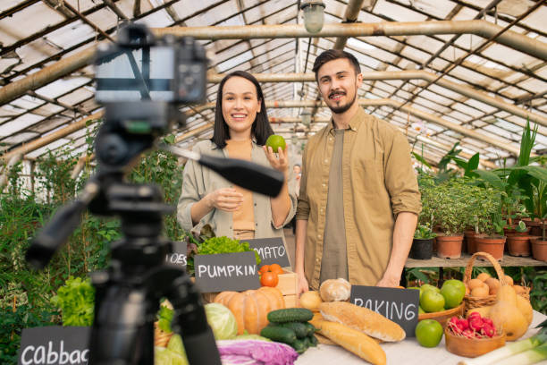 istock Shooting video review in greenhouse 1247828233
