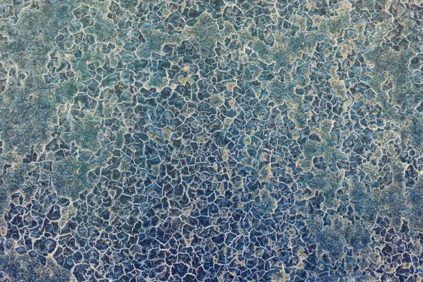 istock vintage blue background with old blue paint with a rough surface, streaks and uneven texture of blue paint on an old rough surface 1247843183