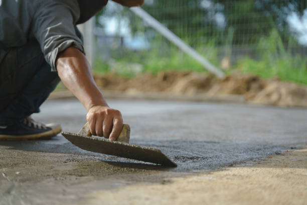 istock Asian worker labor working with concrete cement floor 1247843219