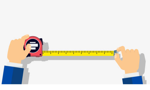 남자의 손에 테이프를 측정. - tape measure yellow long instrument of measurement stock illustrations