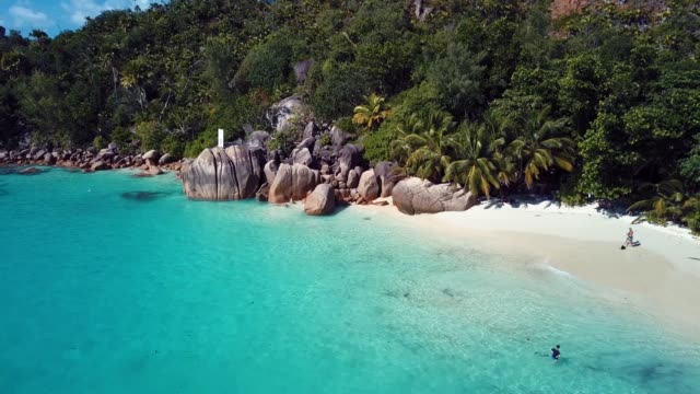 4K Aerial Footage of the Paradise Praslin Island Beach in the Heart of Indian Ocean, Seychelles