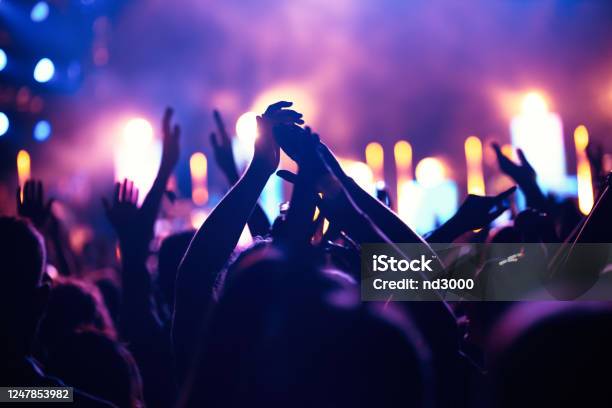 Cheering Crowd With Hands In Air At Music Festival Stock Photo - Download Image Now - Party - Social Event, Music Festival, Nightclub