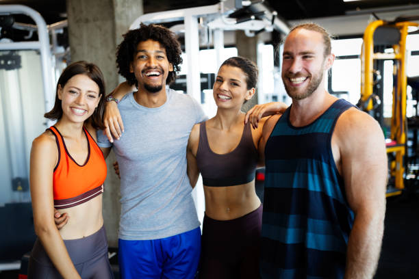istock Beautiful fit people working out in gym together 1247863997