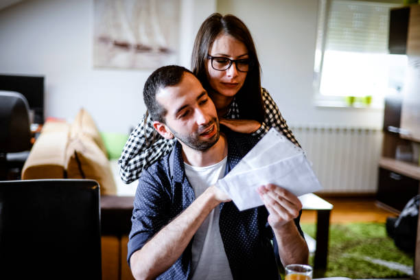 istock Young couple at home 1247871263