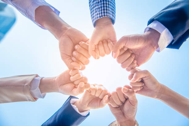 istock Group of people diversity multiethnic teamwork collaboration team meeting communication  Unified team concept. Business people hands together diversity multiethnic diverse culture partner team meeting 1247871817