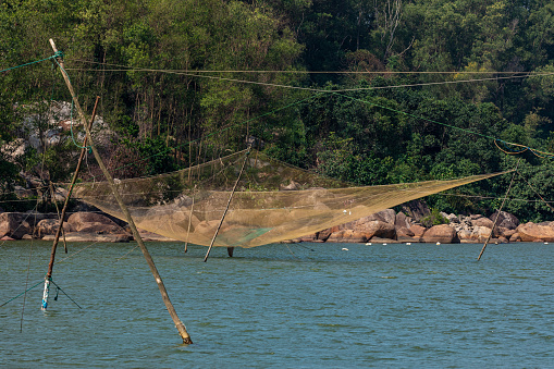 Fishing net in the lagoon  of Lang Co in Vietnam