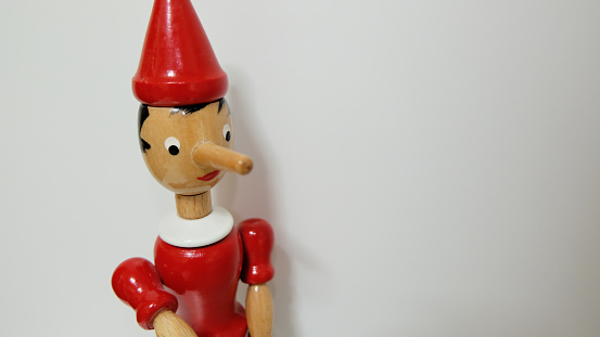 Close-up of a vintage Pinocchio Wooden toy. Based on the Story by Carlo Collodi.