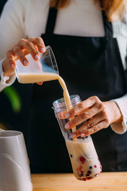 istock Mixing Healthy Shake with Soy Milk and Berries 1247880777