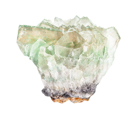 closeup of sample of natural mineral from geological collection - raw green Fluorite (fluorspar) rock isolated on white background