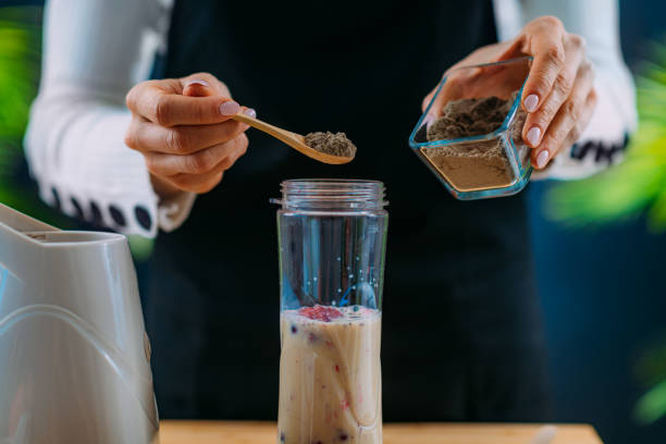 istock Making Healthy Shake with Berries and Plant Protein Powder 1247882516