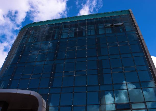 istock Big building in small city 1247882595