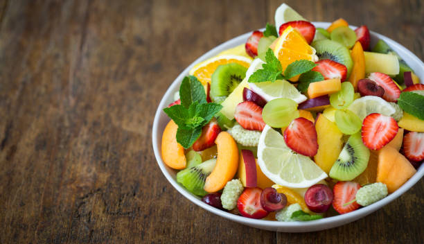 istock Healthy fresh fruit salad in the bowl 1247884017