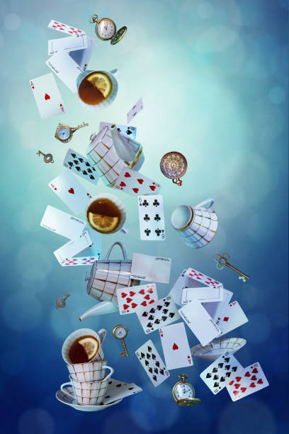 Wonderland background Wonderland background. Mad tea party.Playing cards, pocket watch, key, cup and teapot falling down the rabbit hole. vertical banner. hole cards stock pictures, royalty-free photos & images