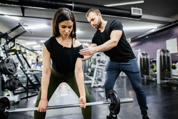 istock Couple working out in gym 1247888108