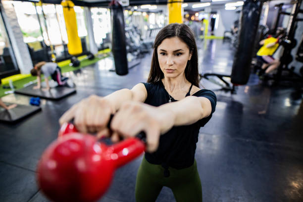 istock Young beauty women in gym 1247888184