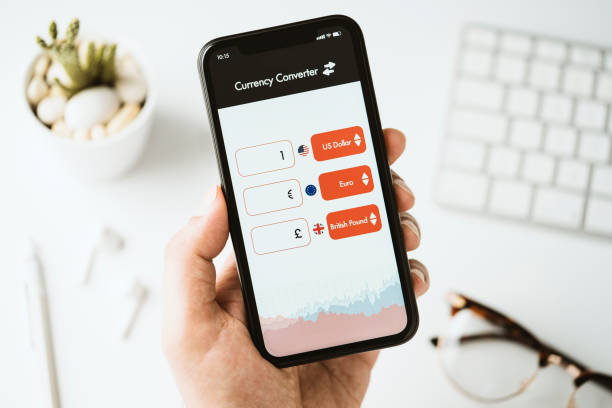 istock Currency converter app on mobile phone screen 1247889487