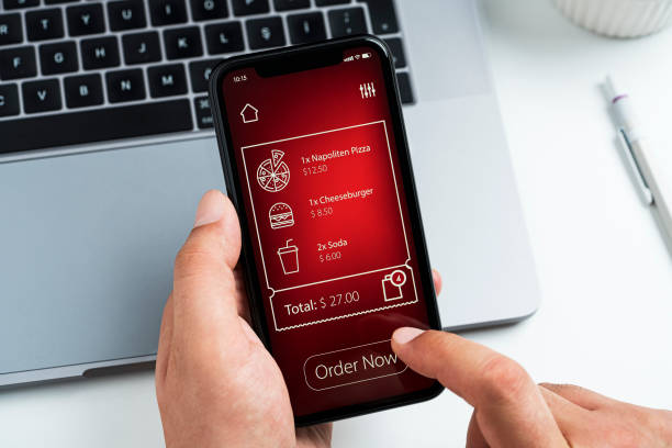 istock Online food order app on mobile phone screen 1247890033