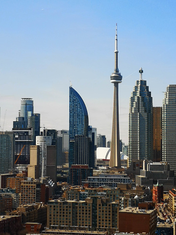 CN Tower and residential buildings in downtown Toronto, Ontario, Canada.