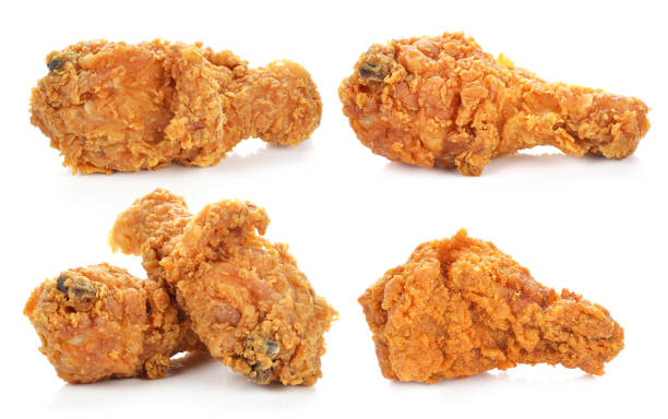 istock Golden brown fried chicken drumsticks on white background. 1247899700