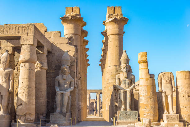 istock Sitting statues in Luxor 1247900004