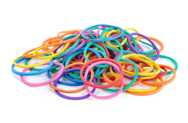 istock pile of colorful rubber bands isolated on white. 1247908920
