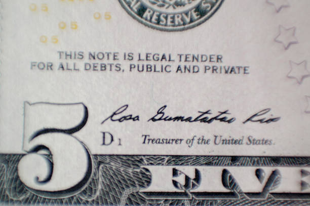 istock Fragment of five dollars bill with figure five 1247919545