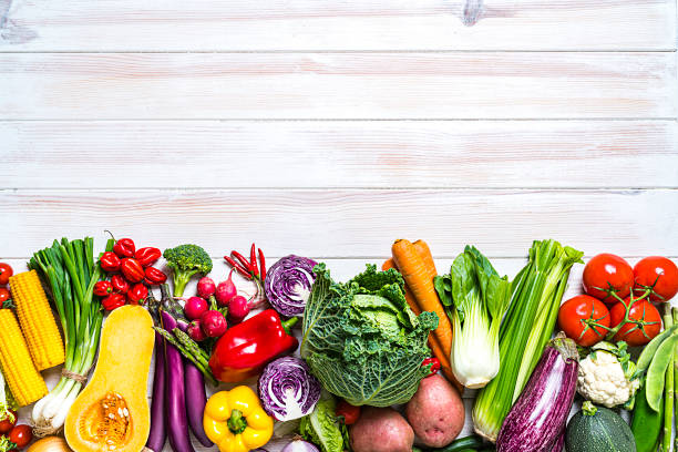 istock Fresh organic vegetables frame on white background. Copy space 1247928418