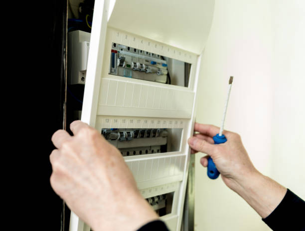 istock The man is repairing the switchboard voltage with automatic switches. 1247935172