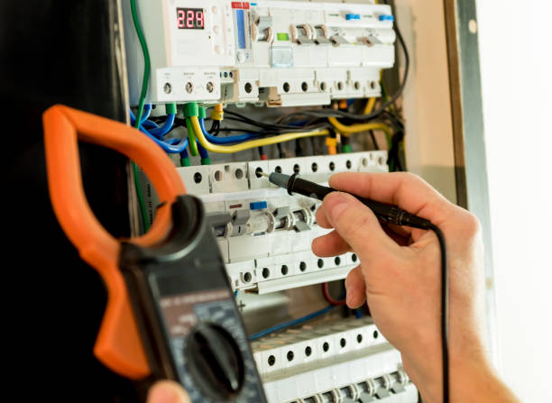 istock The man is repairing the switchboard voltage with automatic switches. 1247945182