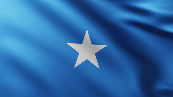 Large Flag of Somalia fullscreen background in the wind with wave patterns