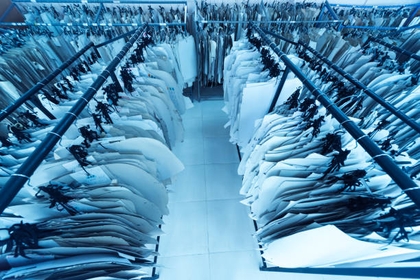 Clothing pattern. Fabric industry production line. Textile factory. Working tailoring process cloth. Modern equipment