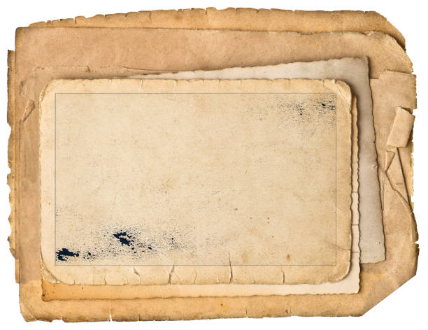 istock Old photo frame field for your picture image Used paper sheets 1247962647