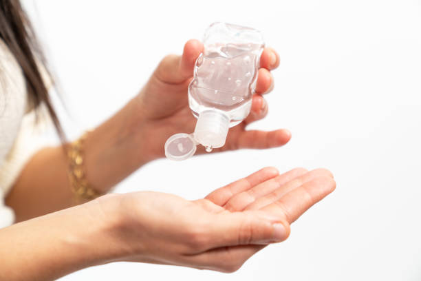 istock Personal hygiene, cleaning hands with disinfectany often to protect from virus. 1247962776
