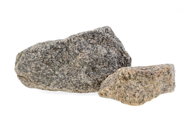 istock natural granite stone on a white background, isolated 1247962990