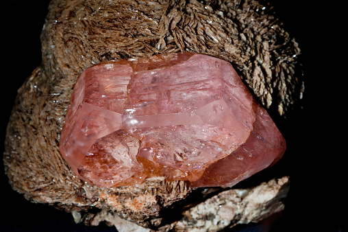 natural purple malaya garnet gem on background