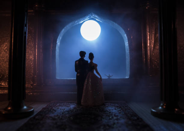 istock Beautiful arabian interior realistic miniature. Table decoration. Romantic couple at window. 1247988816