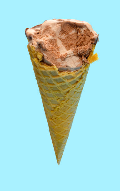 istock angle view fresh chocolate flavor ice cream cone with couple of bites on a blue background 1248005607