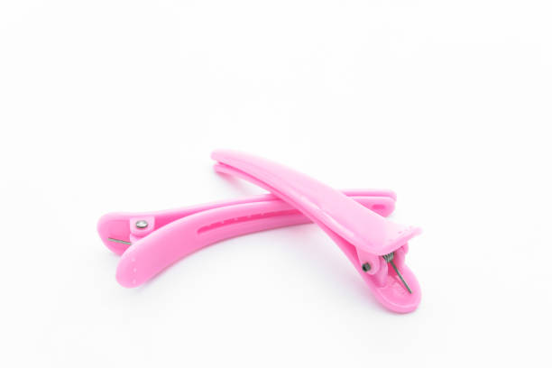 istock Pink hair clips isolated on the white background. 1248043313