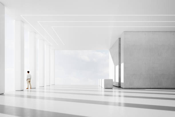 Pensive businessman in modern office lobby
