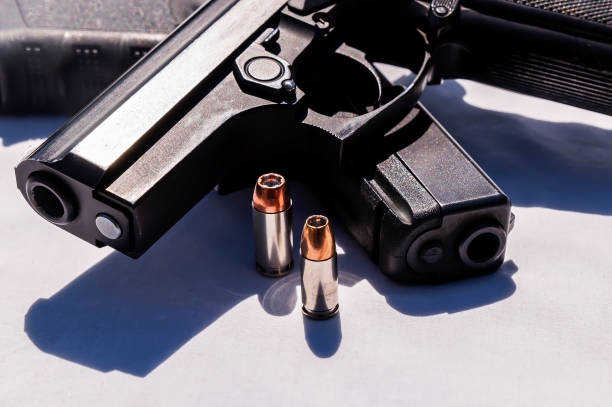 istock Two pistols on a white background 1248081881