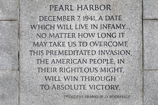 Inscription about Pearl Harbor on the World War II Memorial Washington, D.C., USA - November 11, 2017: Inscription about Pearl Harbor on the World War II Memorial, located on the National Mall. pearl harbor stock pictures, royalty-free photos & images