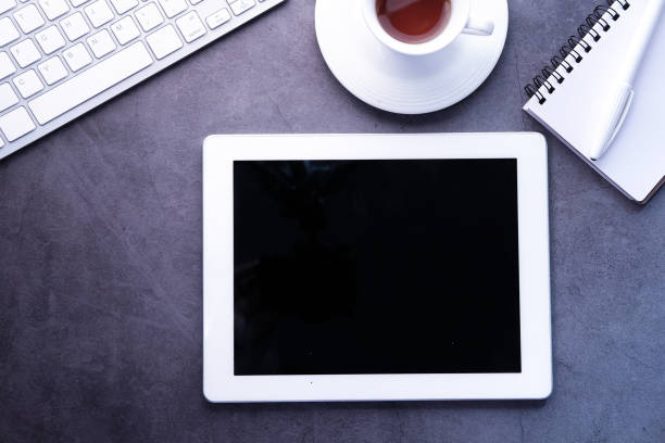 istock Top view of digital tablet with screen on desk 1248083795
