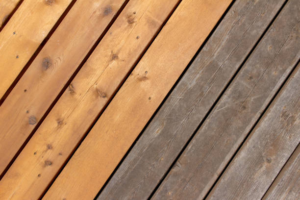 istock Abstract texture background of old and new cedar wood floor boards on a deck 1248096510