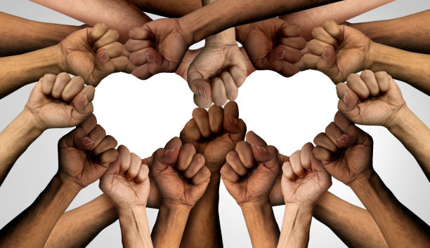 People Protesting Together People protesting together and peaceful Protest group and protester unity and diversity partnership as heart hands in a fist of diverse nonviolent resistance symbol of justice and fighting for a good cause. diversity hands forming heart stock pictures, royalty-free photos & images