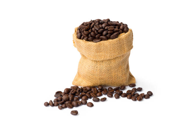 istock Coffee beans in sack bag isolated on white background - Clipping path 1248100810