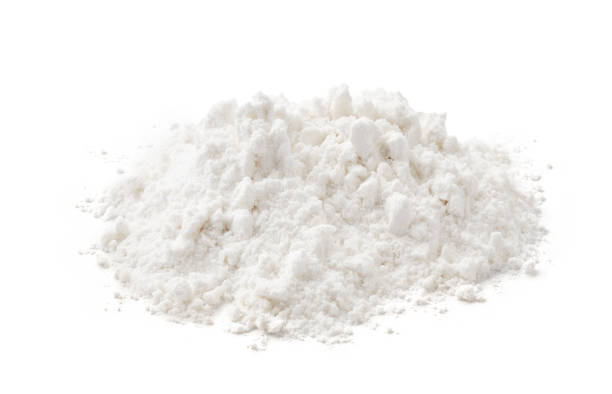 istock Pile of wheat flour isolated on white background 1248117571