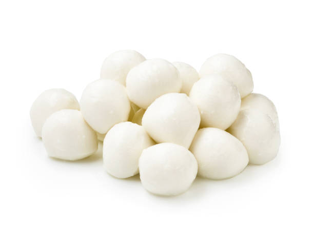 istock Baby mozzarella isolated on white background. Group of bocconcini mozzarella cheese. 1248117626