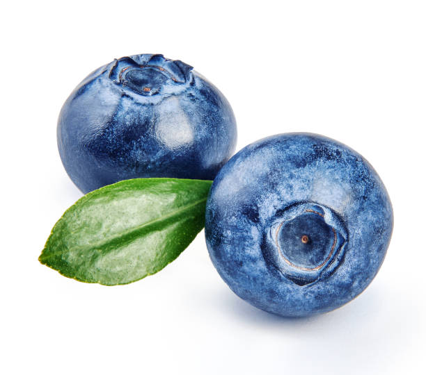 istock Two blueberries with blueberry leaf isolated on white background. 1248118855